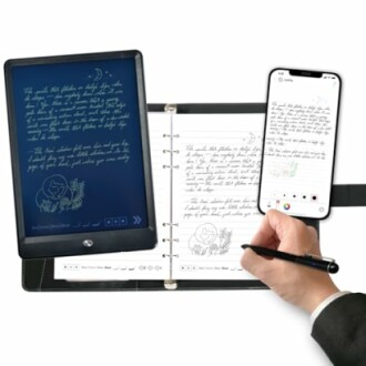 Person writing on a digital tablet and paper notebook with a smartphone nearby.